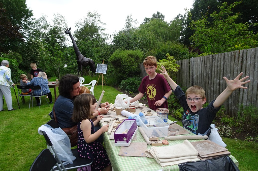 Having fun at the clay table