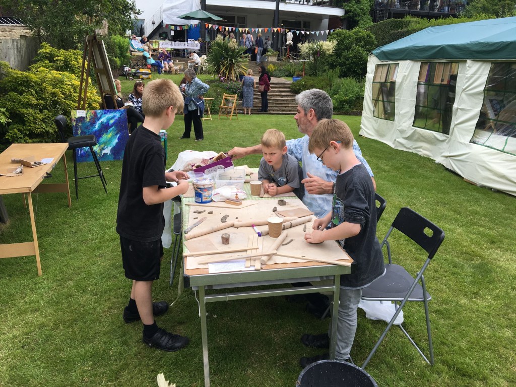 A family playing with clay